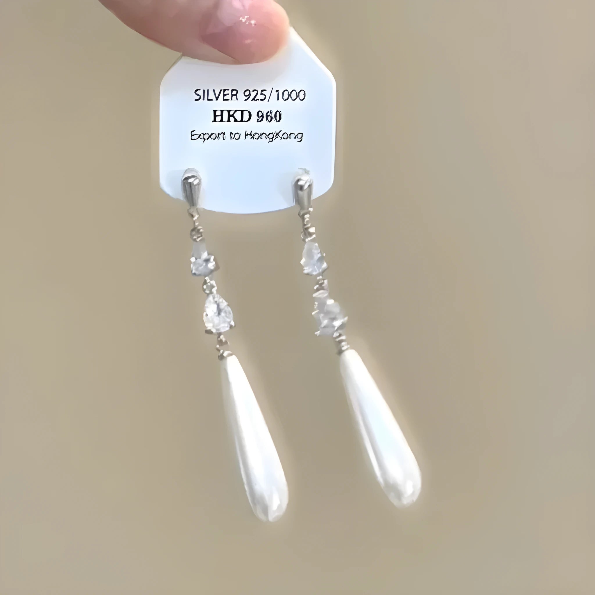 Geometric heart-shaped women's earrings with rhinestone accents and tassel details in electroplated alloy