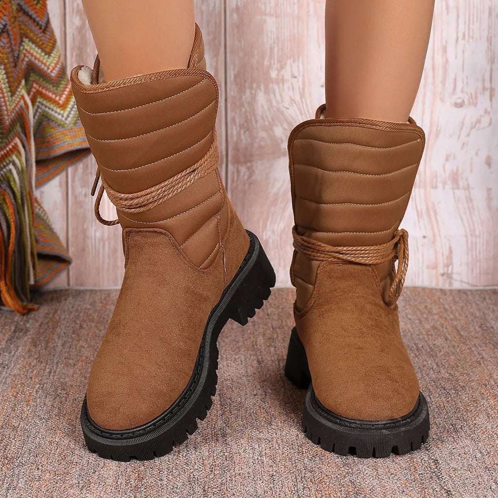Women's black suede snow boots with chunky heel, lace-up front and fleece lining