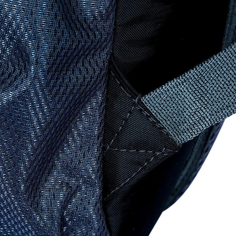 Large black Oxford cloth travel backpack showing front view with straps and soft handle.