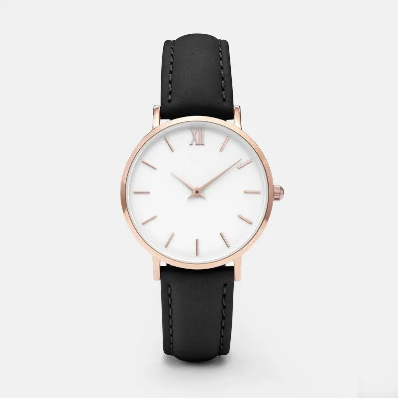 Square-faced quartz watch with an alloy case and PU leather strap on a wrist.