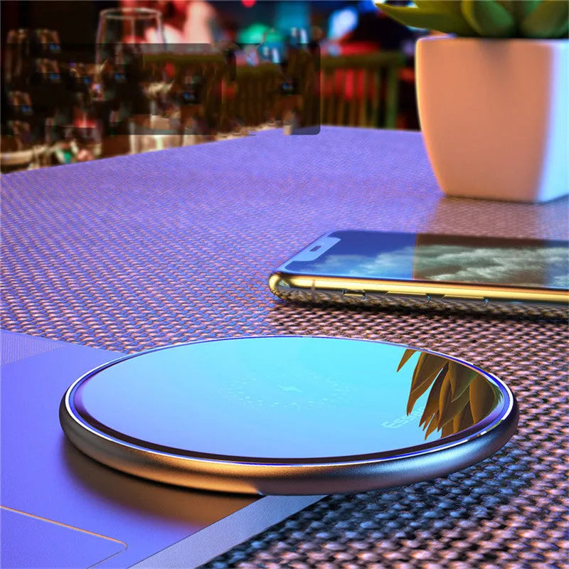 Black or white aluminium alloy Qi wireless charging pad with LED light, 10.1 cm by 7 cm