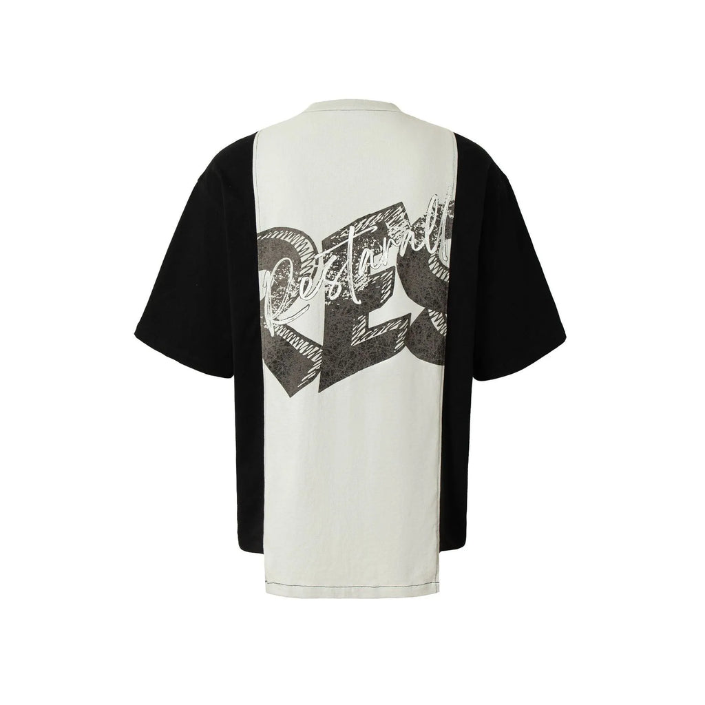 Mens loose black and white deconstruction print cotton t-shirt on a model, showing short sleeves and streetwear style.