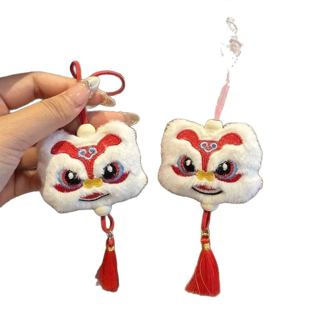 Blue and yellow Chinese style plush lion keychain ornament with star stone decorative elements