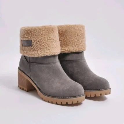 Women's thick suede mid-calf snow boots with a round toe, flat low heel, and waterproof platform sole.