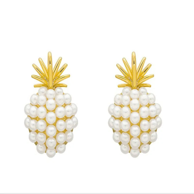 Korean style gold pineapple starfish pearl earrings made from electroplated alloy with inlaid stones.
