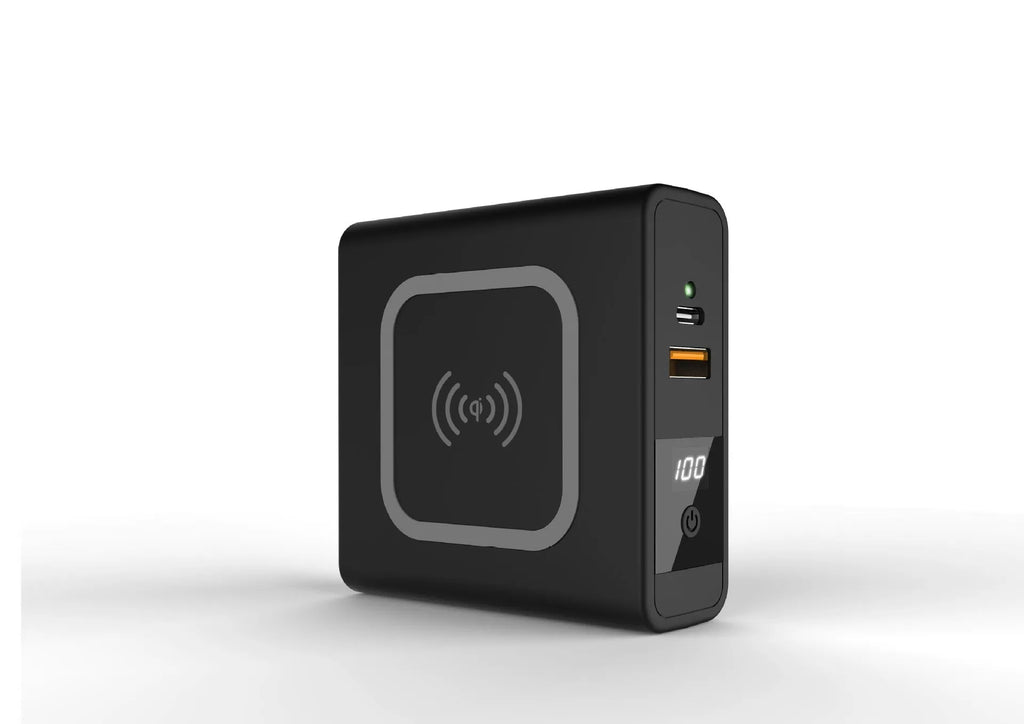Black and white Super QI wireless charging power bank with integrated plug and international adaptors.