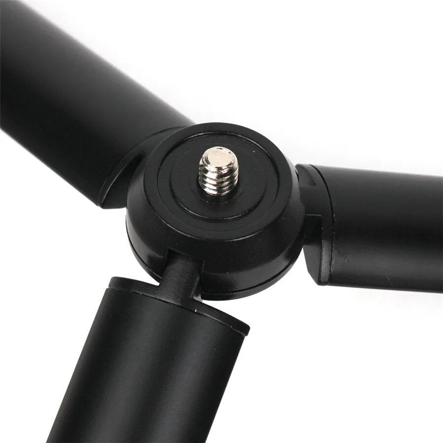 Black aluminium alloy mobile phone tripod stabiliser compatible with iPhone handheld photography accessory