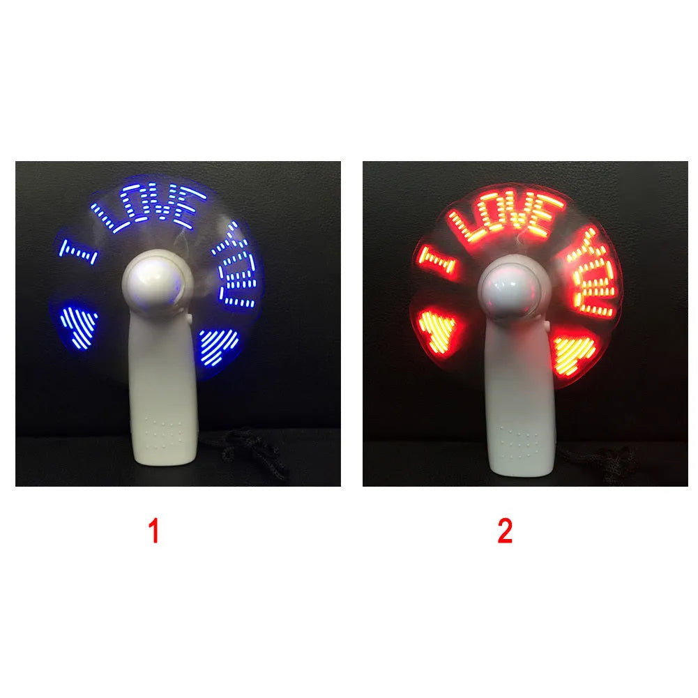 White handheld mini fan with flashing I love you LED pattern in blue and red lights