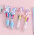 Cute cartoon-themed four-colour press ballpoint pen with 0.7mm tip, showing one random design variant.