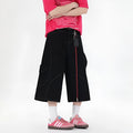 Retro denim workwear shorts with multiple pockets in wide leg cropped design