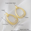 Yellow gold geometric drop earrings with round and oval elements measuring 2.6cm by 1.7cm
