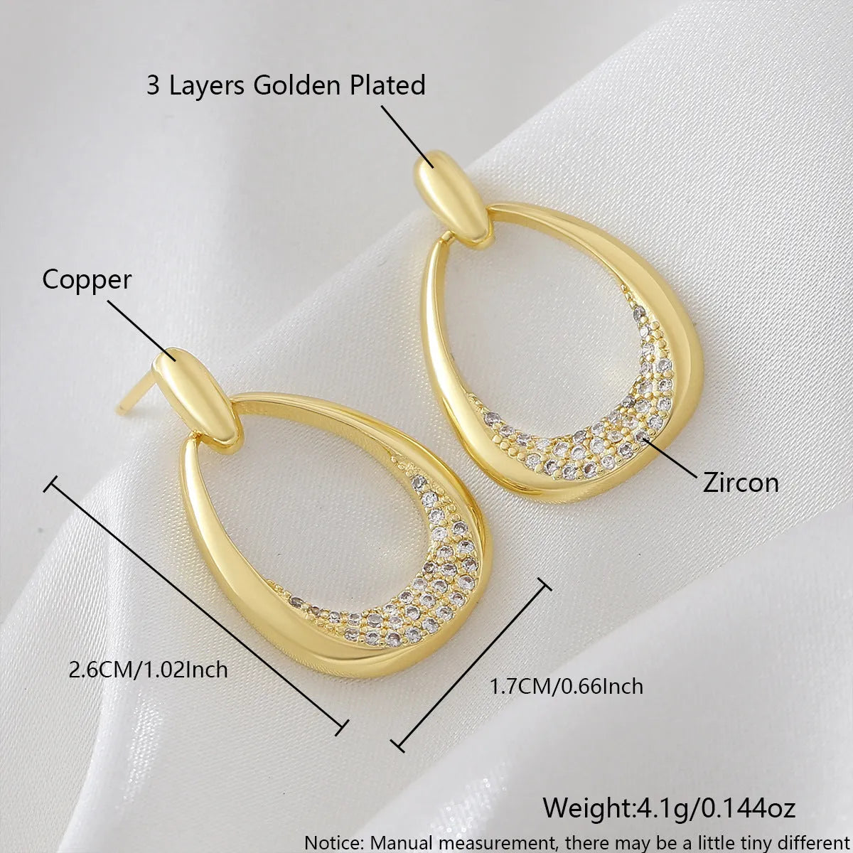 Yellow gold geometric drop earrings with round and oval elements measuring 2.6cm by 1.7cm