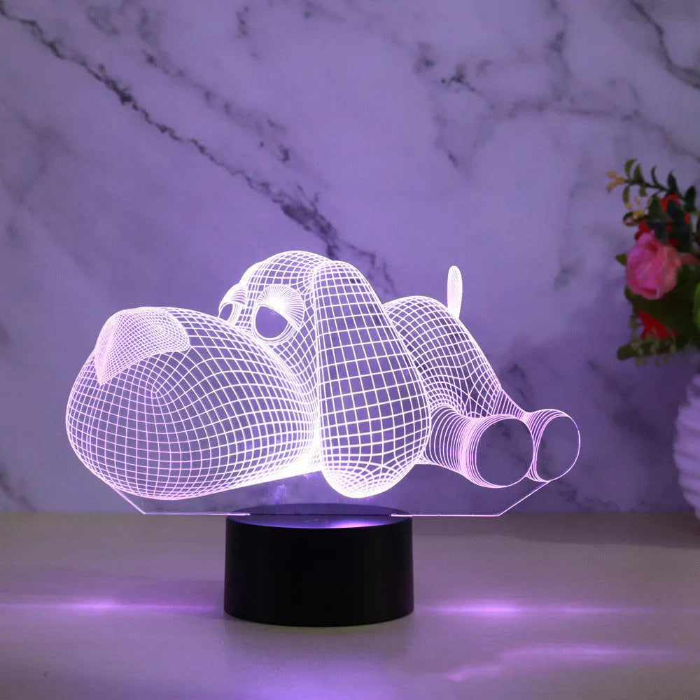 Dog-shaped desktop lamp glowing in blue with touch button and USB power cable