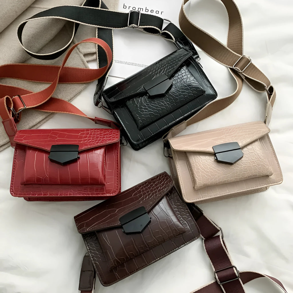 Vintage-style black PU leather crossbody bag with dimensions 20cm by 14cm by 7cm.