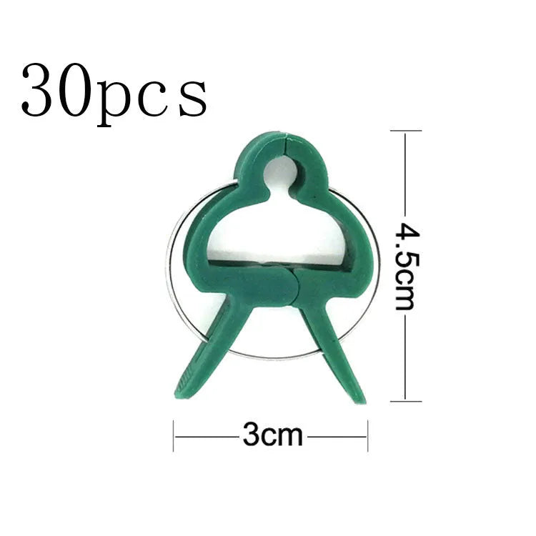 Green plastic and zinc plant fixing clips in large and small sizes for climbing vegetables
