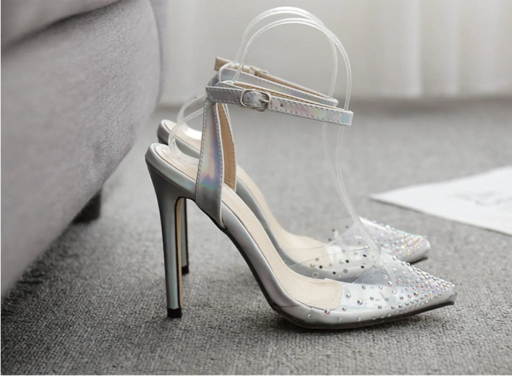 Women's pointed diamond sandals with stiletto heels and strappy PVC construction