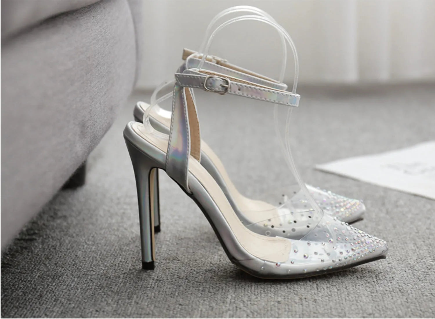 Women's pointed diamond sandals with stiletto heels and strappy PVC construction