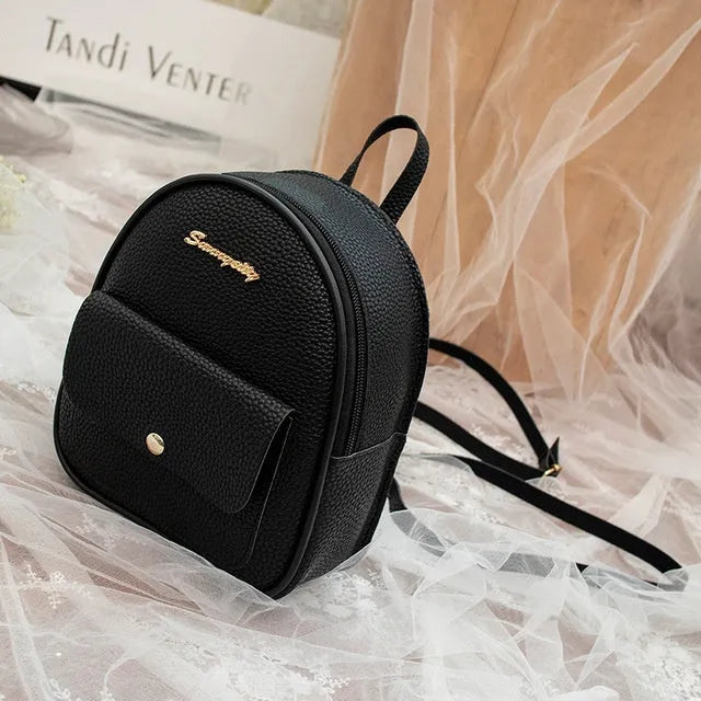 Women's black PU shoulder bag backpack compact letter purse with zipper closure