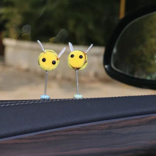 Yellow fur ball bee car decoration measuring 3cm square with cartoon design