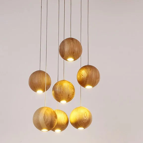 Nordic style solid wood ball chandelier pendant light with adjustable hanging cord.
