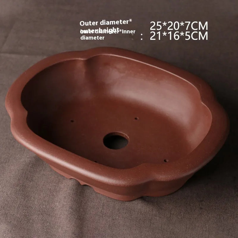Handmade purple clay bonsai basin measuring 25x20x7 cm with classical Chinese design
