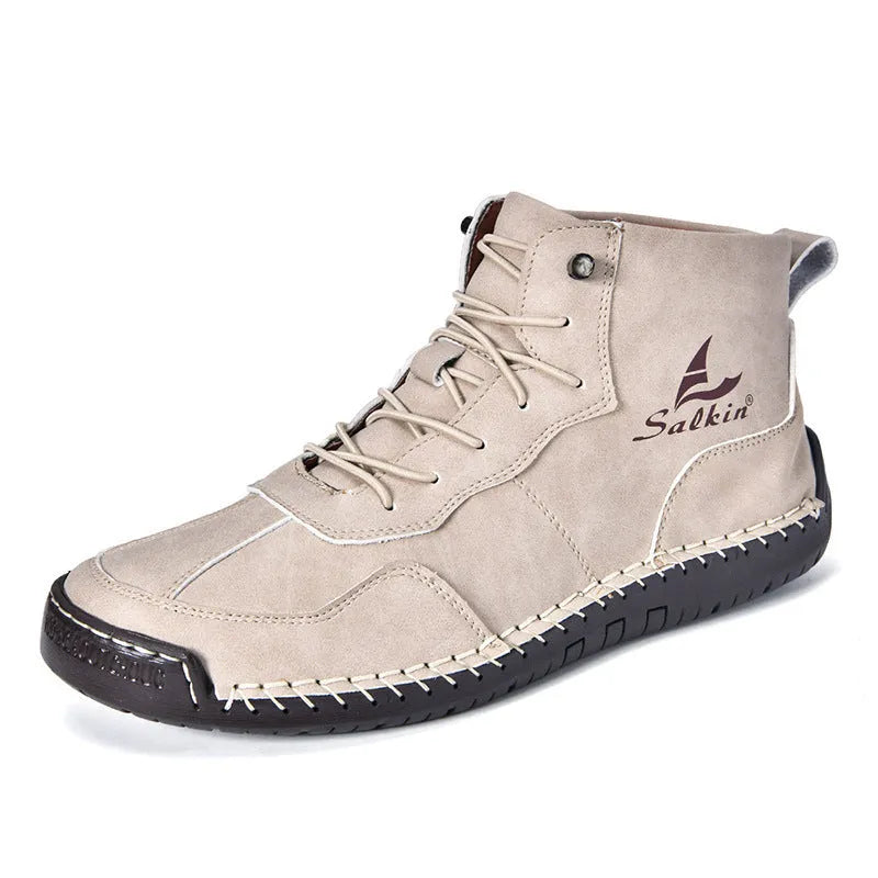 Men's beige retro high-top casual boots with elastic band and round toe on a non-slip rubber sole.