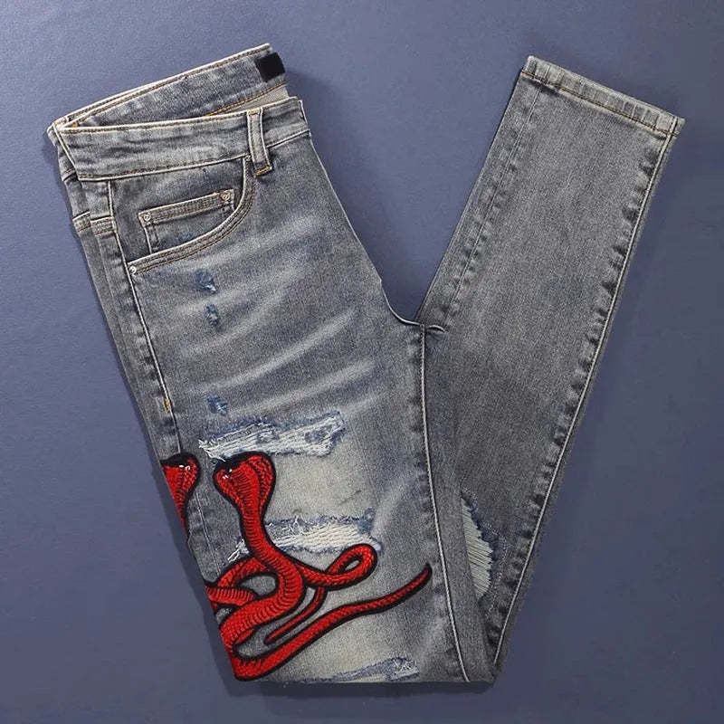 Mens old colour distressed patchwork skinny jeans with embroidery on a micro-elasticity cotton fabric.
