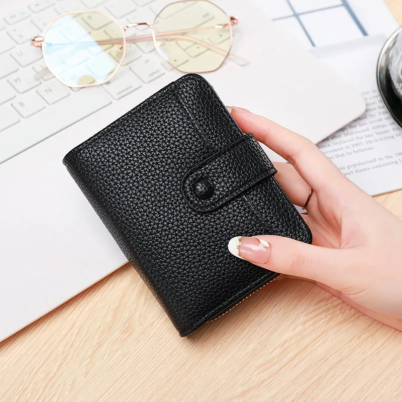 Ladies' short wallet with lychee pattern in 2-fold PU design showing colour options