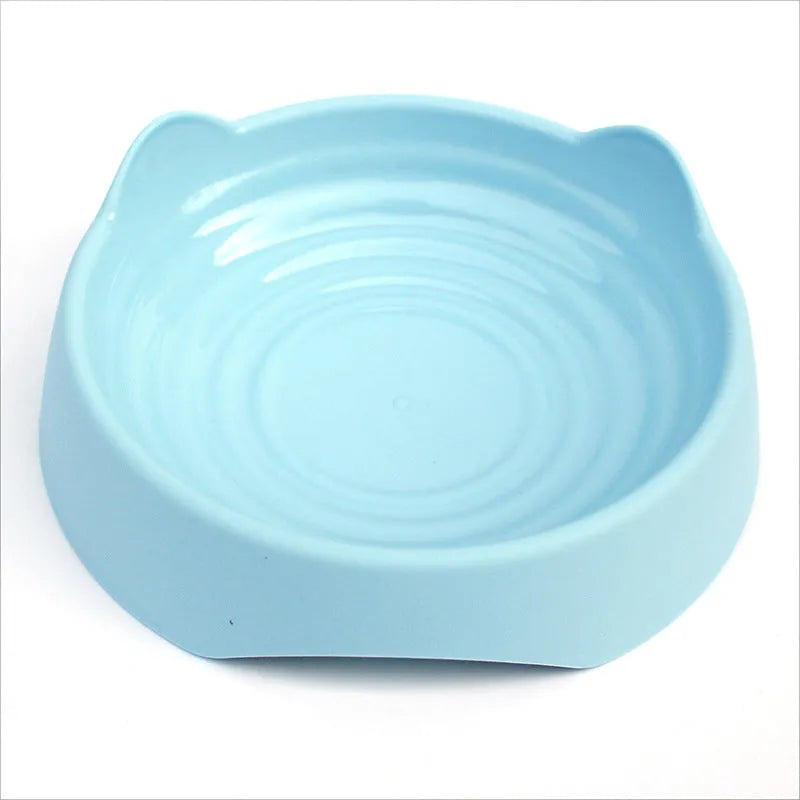 Blue ceramic dog slow feeder bowl with raised maze cups for fast-eating puppies