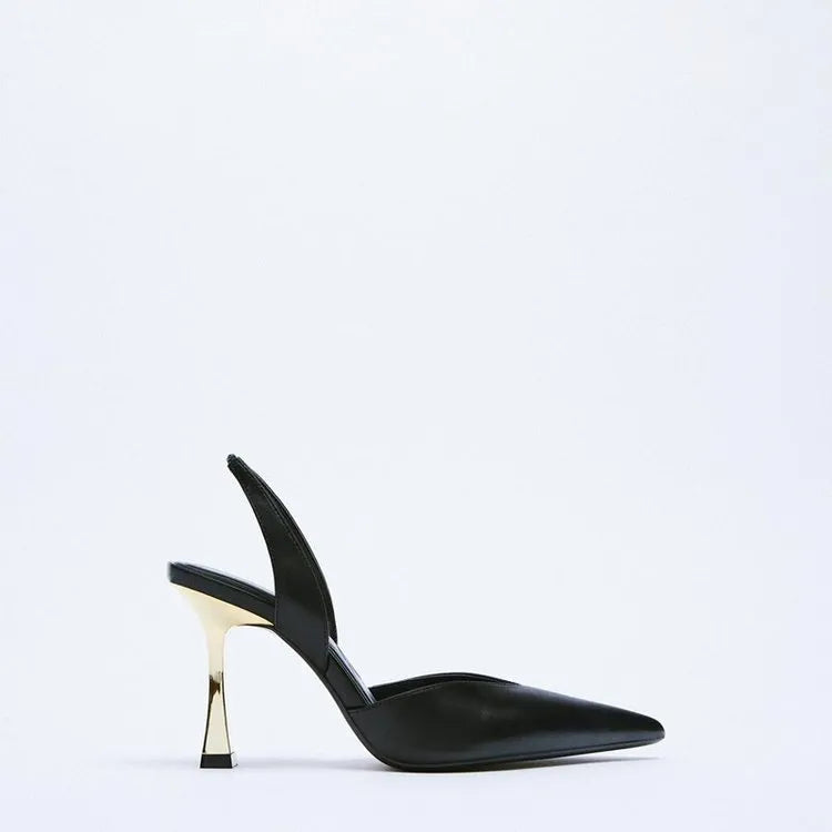 Women's pointed patent leather high heels in nude apricot colour with shallow cut design
