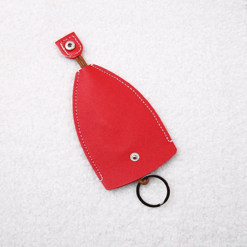 Cartoon pull-out key case in PU leather with colourful design, showing compact 14cm by 7.5cm dimensions