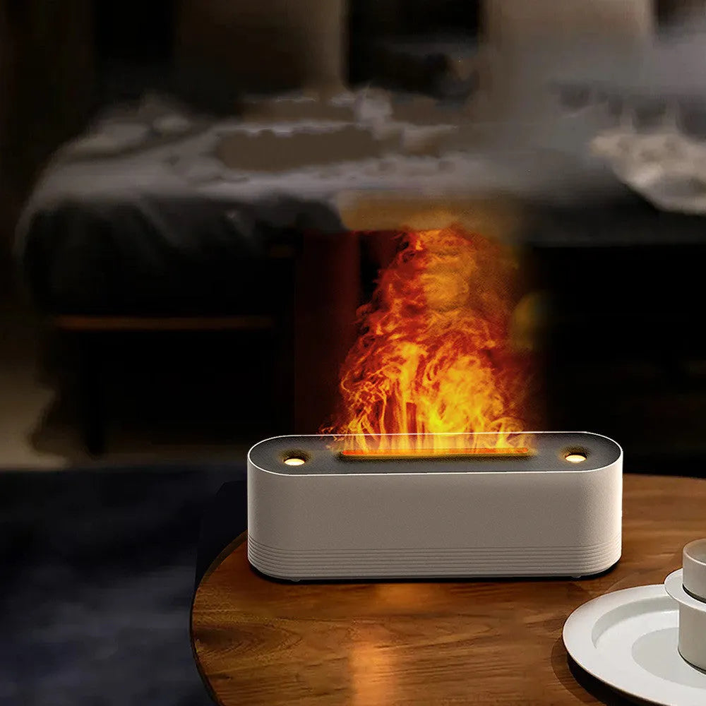 Black ultrasonic humidifier diffuser with colourful LED lights creating flame-like mist effect