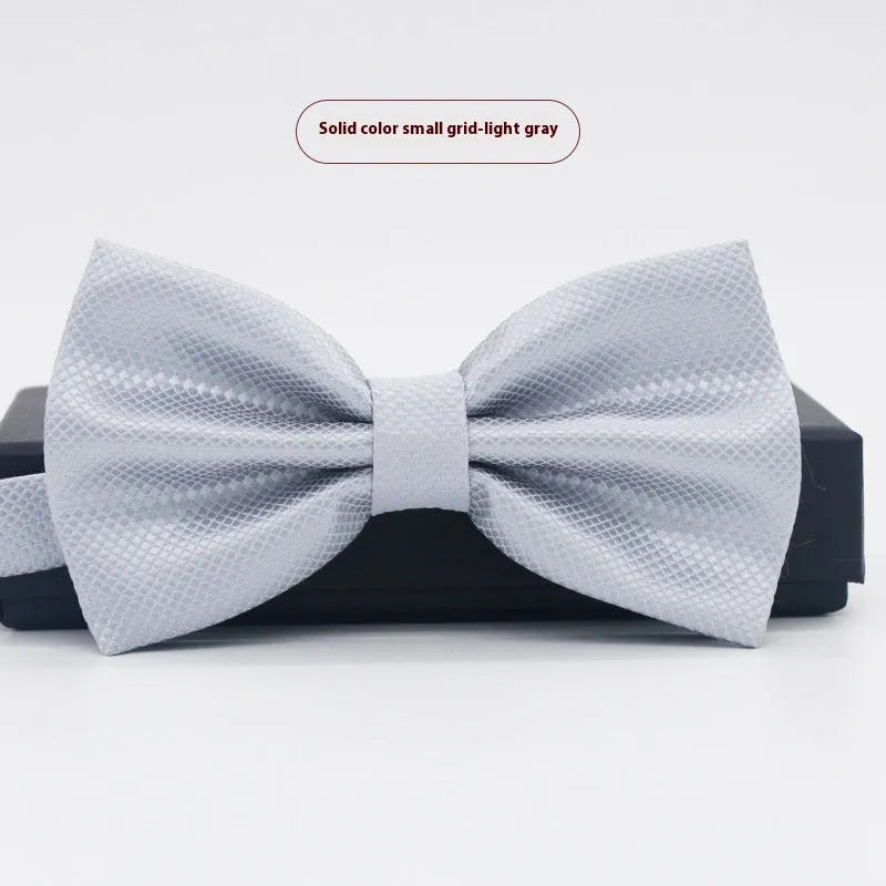 Men's solid colour formal bow tie in flat head style showing 12x6cm dimensions