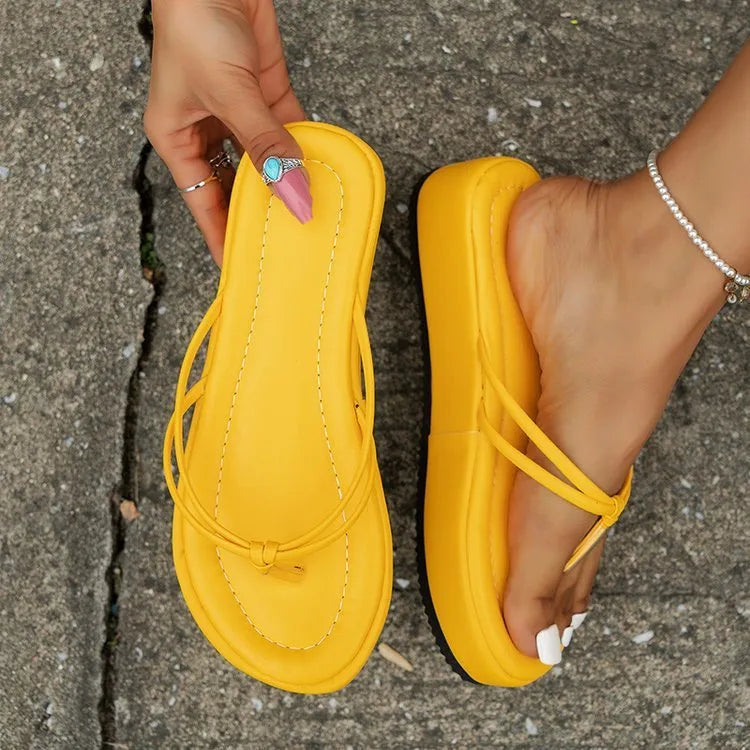 Thick rubber sole flip-flops in multiple colours with round toe shape and PU upper material