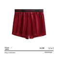 Men's solid colour knitted polyester boxer briefs on a mid-waist model, showing colour options black, blue, red, silver, purple, and brown.