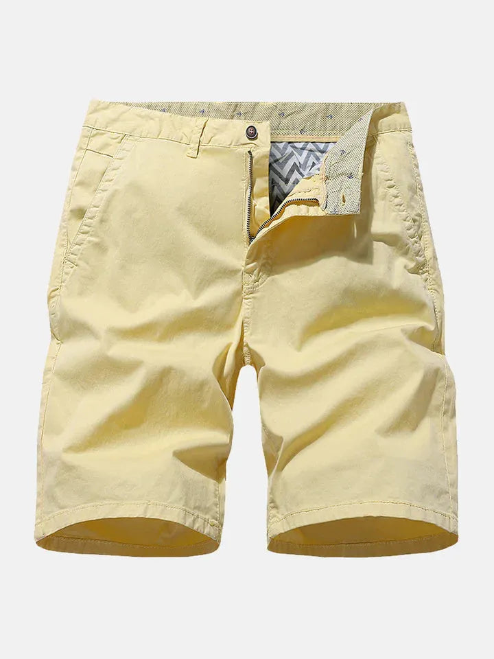 Blue printed denim shorts for men with a loose straight-leg fit and elasticated waistband.