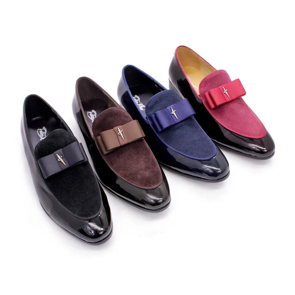 Men's black patent leather low-top shoes with a gold tassel detail and rubber sole.