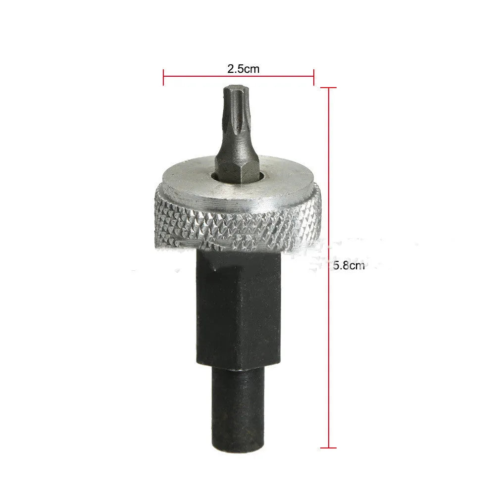 Close-up of an ignition module wrench tool with aluminium knurled knobs on a carbon steel handle.