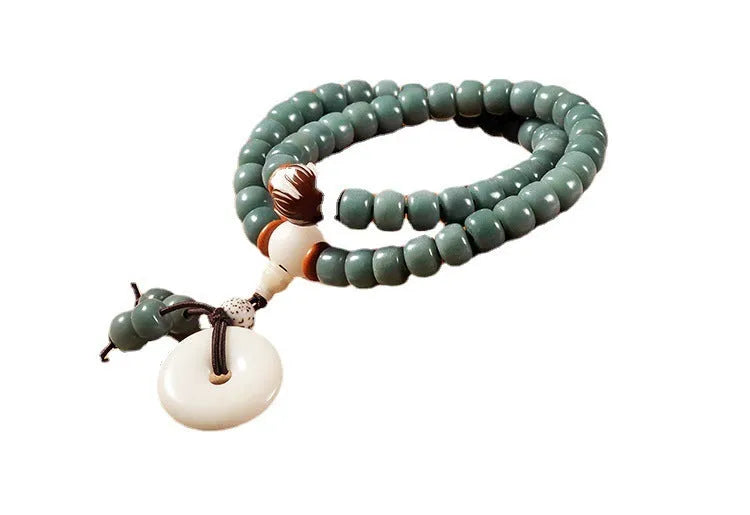 White Jade Bodhi Green Sandalwood beaded bracelet with a choice of safety buckle or lotus clasp.
