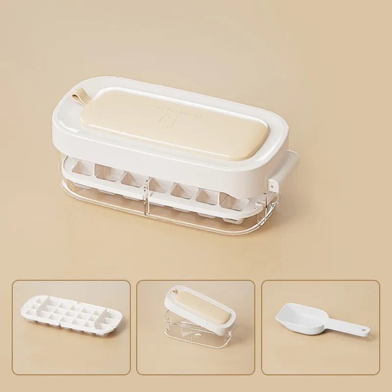 Blue high-capacity ice cube tray with integrated storage for an ice shovel.