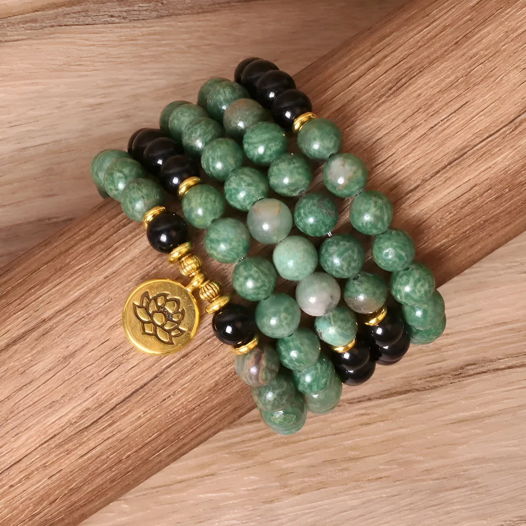 Green and black alloy beaded elastic bracelet with stretch band on wrist