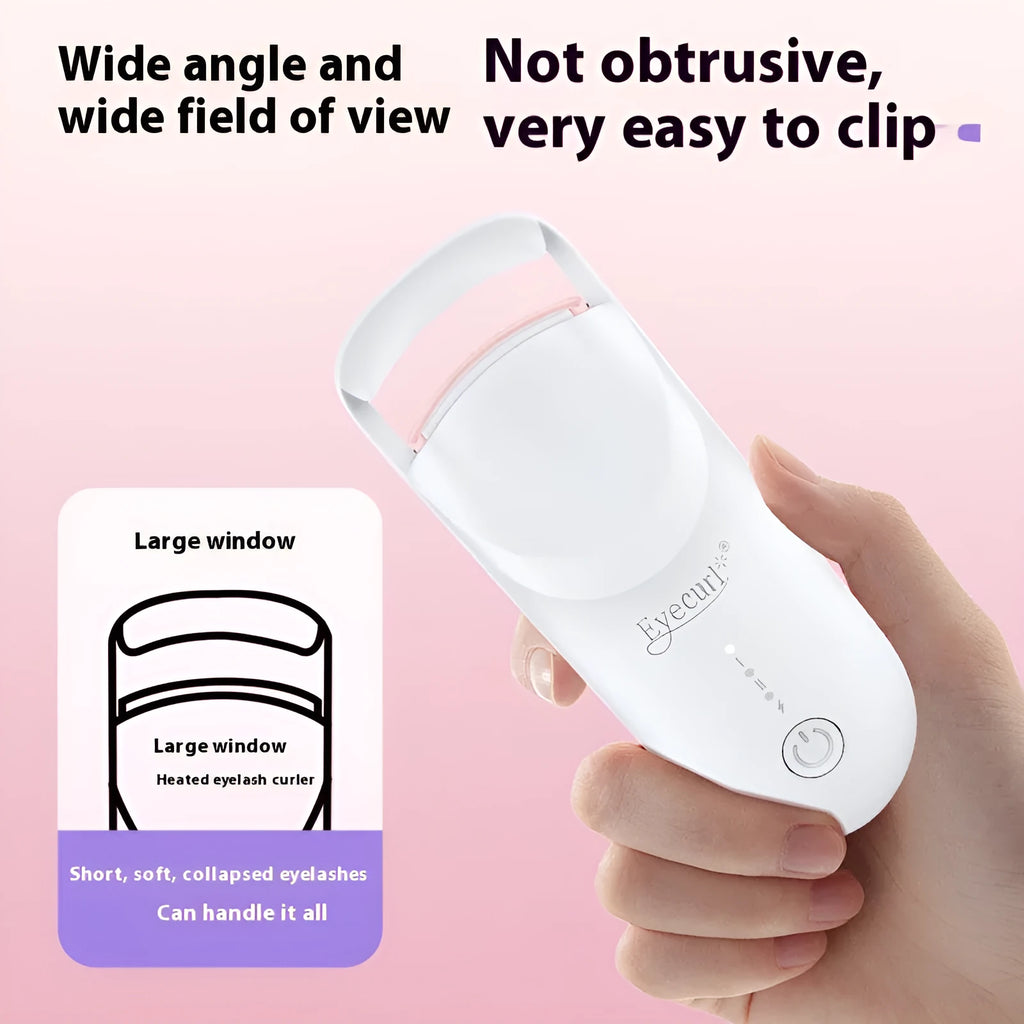 Electric heating eyelash curler in pink with USB charging cable on a white background