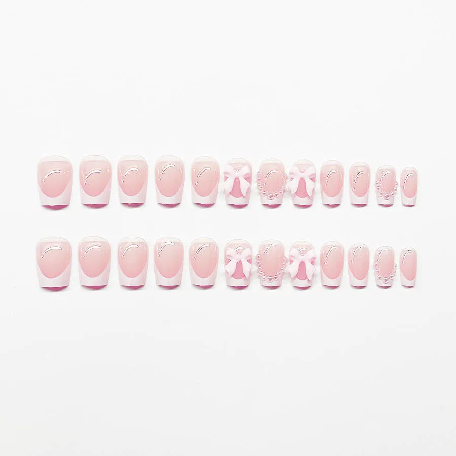 French manicure false nails set with white tips featuring tulip, bow, starry sky and leopard print patterns