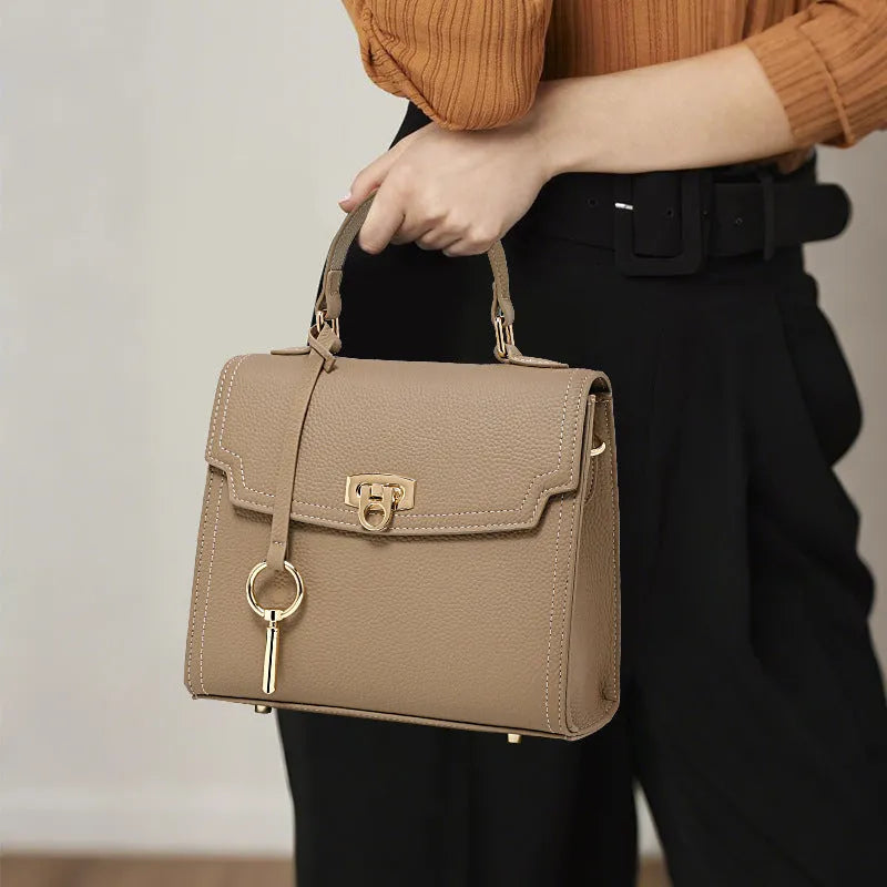 Elephant grey vintage lock handbag with litchi pattern leather and crossbody straps