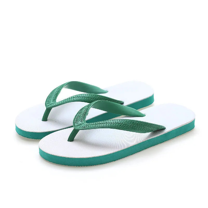 Men's rubber flip-flops in green with a fish label on the strap, showing the non-slip tread pattern on the sole.