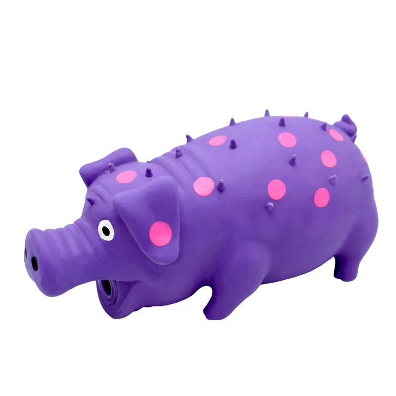 Blue latex pig-shaped dog chew toy with textured surface and squeaker for aggressive chewers