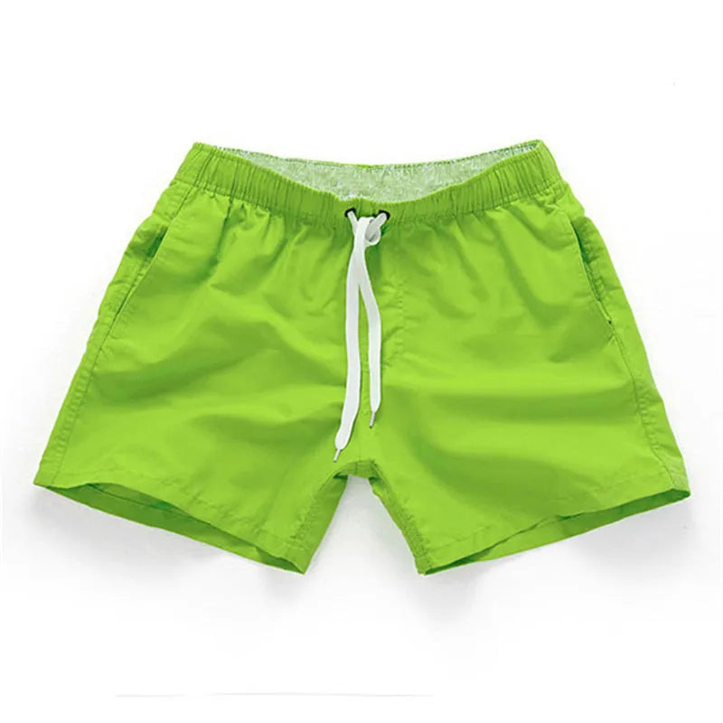 Men's straight leg beach shorts in polyester fabric available in multiple colours and sizes S to 4XL