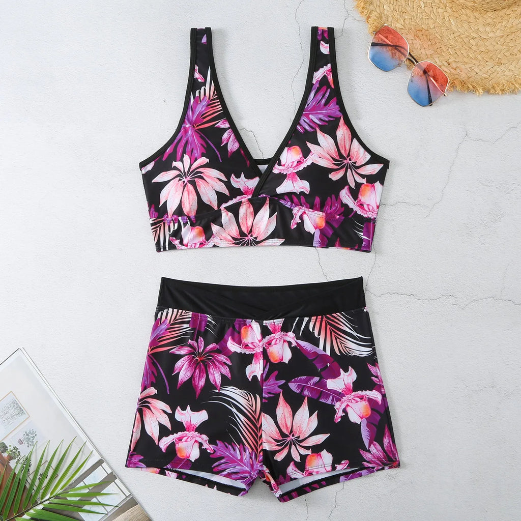 Women's two-piece swimsuit with sleeveless top and printed boxer shorts in multiple colours.