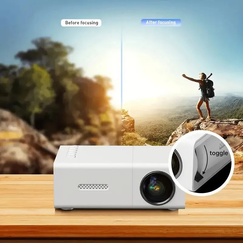 M100 mini portable LED projector in black or white with remote control and cables