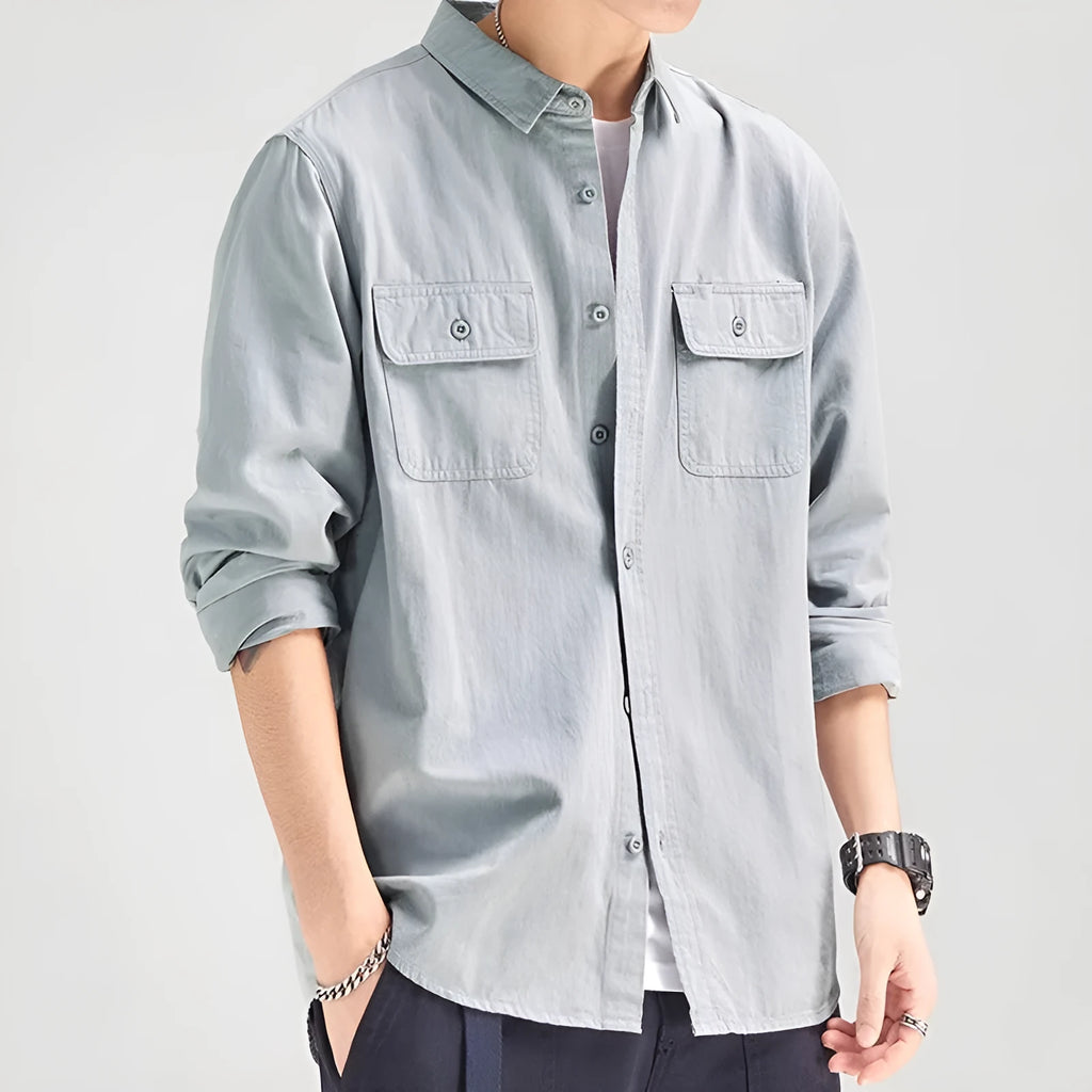 Men's loose long sleeve polyester shirt in cardigan style on a hanger, shown in light grey colour